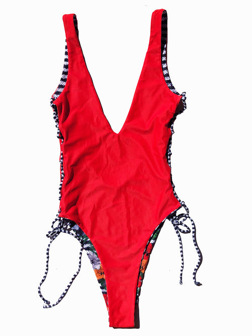 Red, white, black and orange reversible swimsuit. Plunging V-neck, lace-up detailing on the sides, scoop back and a high-cut leg design 4