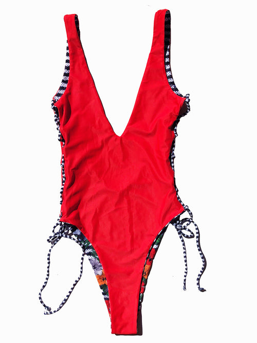 Red, white, black and orange reversible swimsuit. Plunging V-neck, lace-up detailing on the sides, scoop back and a high-cut leg design 4