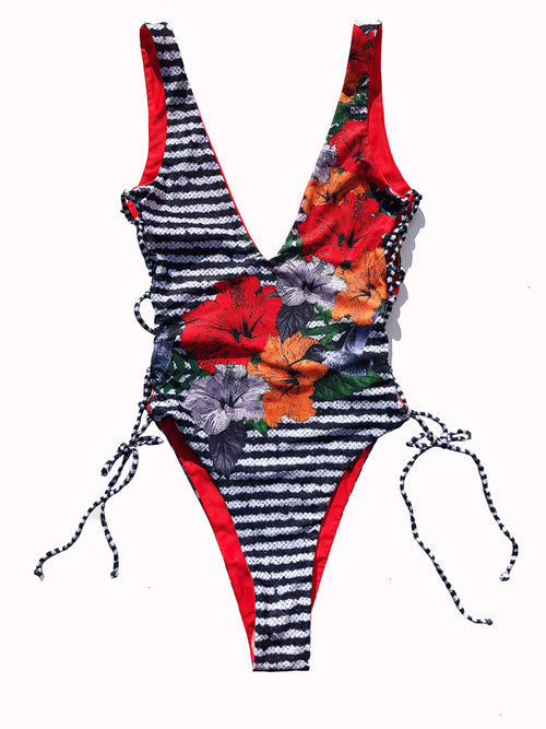 Red, white, black and orange reversible swimsuit. Plunging V-neck, lace-up detailing on the sides, scoop back and a high-cut leg design 3